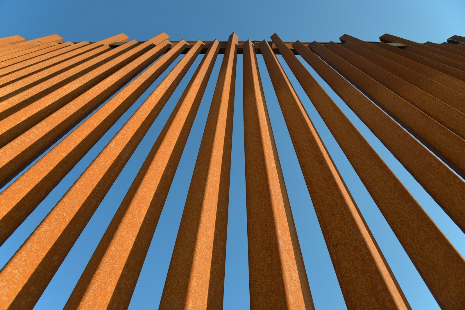 A very tall building with a sky in the background